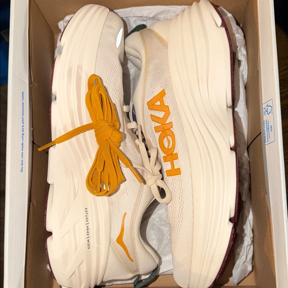 Hoka Cream Running Shoes with Mustard Yellow Laces and Burgundy Outsoles